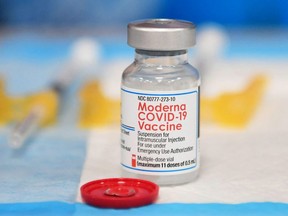 In this file photo taken Dec. 15, 2021, the Moderna COVID-19 vaccine awaits administration at a vaccination clinic in Los Angeles.