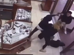 Staff at a California jewelry store fought back against robbers on Sunday via some kung fu. The robbers were attempting to smash cases and grab baubles at the Huntington Beach store, but punches and kicks dished out by employees, including the owner's children, had the bandits bailing without any spoils. It was all captured on video. It started with a man entering the Princess Bride Diamonds jewelry store in the Bella Terra shopping mall and smashing a display case with a hammer. Three others followed him in wearing backpacks.