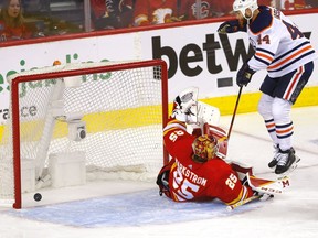 Edmonton Oilers Zach Hyman scores on Calgary Flames goalie Jacob Markstrom in second period action during Round two of the Western Conference finals at the Scotiabank Saddledome in Calgary on Wednesday, May 18, 2022. Darren Makowichuk/Postmedia