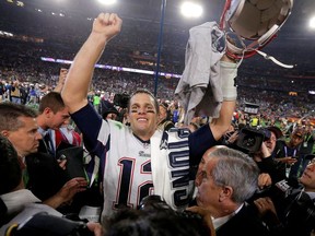 New England Patriots quarterback Tom Brady celebrates his team's win over the Seattle Seahawks in the NFL Super Bowl XLIX football game in Glendale, Arizona February 1, 2015.