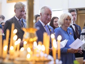 Prince Charles and Camilla, Duchess of Cornwall, take part in a traditional prayer service at a Ukrainian church in Ottawa on their Canadian Royal Tour, May 18, 2022.