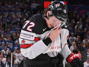 Canada's defender Thomas Chabot of the Ottawa Senators reacts after Finland beat Canada in overtime at the world hockey championship in Tampere, Finland, on Sunday.