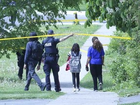 A man with a rifle was shot by police in the East Ave. and Lawrence Ave. area on Thursday, May 26, 2022.