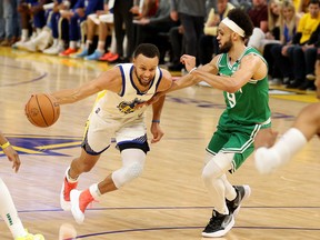 Stephen Curry #30 of the Golden State Warriors drives against Derrick White #9 of the Boston Celtics during the second quarter in Game Two of the 2022 NBA Finals at Chase Center on June 5, 2022 in San Francisco.