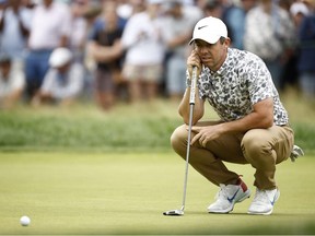 Rory McIlroy of Northern Ireland lines up a putt on the ninth green during round one of the 122nd U.S. Open Championship at The Country Club on June 16, 2022 in Brookline, Massachusetts.