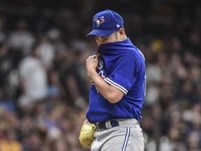 Toronto Blue Jays pitcher Yusei Kikuchi (16) reacts between batters in the second inning during game against the Milwaukee Brewers at American Family Field.