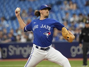 Toronto Blue Jays starter Kevin Gausman (34) pitches to the Boston Red Sox during the first inning at Rogers Centre.