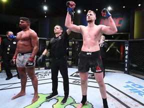 In this handout image provided by UFC, Alexander Volkov of Russia reacts after his knockout victory over Alistair Overeem of the Netherlands in their heavyweight fight during the UFC Fight Night event at UFC APEX on Feb. 6, 2021 in Las Vegas, Nevada.