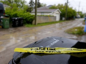 Back alley in the 1500 block of 21st Avenue N.W. where an 83-year-old women was attacked and killed by three dogs in Calgary on Sunday, June 5, 2022.