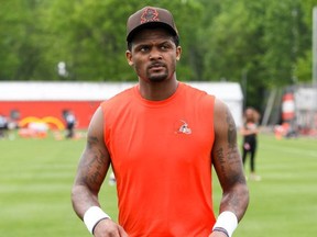 Deshaun Watson #4 of the Cleveland Browns walks off the field after the Cleveland Browns OTAs at CrossCountry Mortgage Campus on May 25, 2022 in Berea, Ohio. (Photo by Nick Cammett/Getty Images)