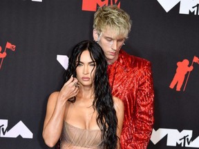 Actress Megan Fox and singer Machine Gun Kelly arrive for the 2021 MTV Video Music Awards at Barclays Center in Brooklyn, N.Y., Sept. 12, 2021.
