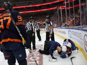 Nazem Kadri of the Colorado Avalanche is tended to for an injury as they take on the Edmonton Oilers in the first period in Game 3 of the Western Conference Final of the 2022 Stanley Cup Playoffs at Rogers Place on June 4, 2022 in Edmonton.