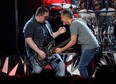 Wolfgang Van Halen performs "Panama" with his father Eddie Van Halen at the 2015 Billboard Music Awards in Las Vegas.