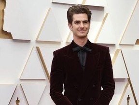 Andrew Garfield poses on the red carpet during the Oscars arrivals at the 94th Academy Awards in Hollywood, Los Angeles, Calif., March 27, 2022.