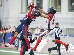 Alouettes' Wesley Sutton intercepts the ball during first-half pre-season action at Molson Stadium Friday night.