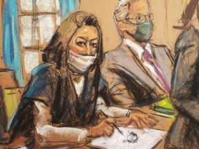 Ghislaine Maxwell, the Jeffrey Epstein associate accused of sex trafficking, makes a sketch of court artists during a pre-trial hearing ahead of jury selection, in a courtroom sketch in New York City, Nov. 1, 2021.