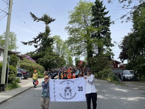 People take part in a march in Mission, B.C., Saturday, June 4, 2022 in a handout photo. Indigenous leaders have called a meeting with RCMP in Chilliwack, B.C., to discuss how police intend to proceed after a pickup truck driver allegedly hit four members of a memorial march on Saturday.