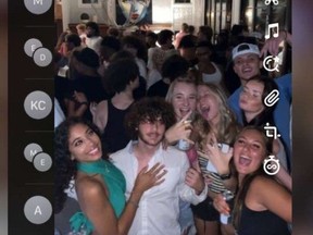 Snapchat photo of group of teens at illegal party.
