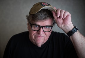 Documentary filmmaker and author Michael Moore poses for a photograph after an interview at the Vancouver International Film Festival on Oct. 4, 2019.