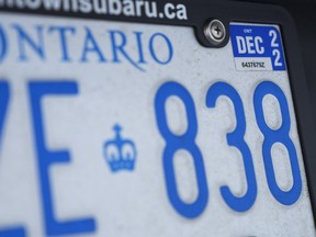 A photograph of an Ontario provincial licence plate with a renewal sticker is shown in Mississauga, Ont., on Tuesday, Feb. 22, 2022.