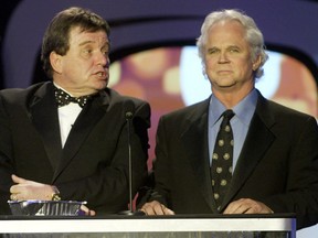 Actors Jerry Mathers, left, and Tony Dow, stars of the hit comedy series "Leave It To Beaver" act as presenters during a taping of the second annual TV Land Awards in Hollywood, March 7, 2004.