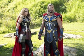 Natalie Portman as Mighty Thor and Chris Hemsworth as Thor in Marvel Studios' Thor: Love and Thunder.