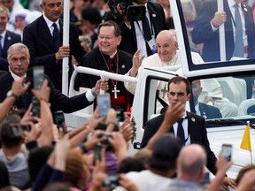 Pope Francis waves to the crowd as he departs the Citadelle de Québec in Quebec City, July 27, 2022.