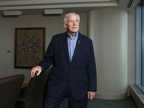 Doug Mitchell is pictured in a boardroom Borden Ladner Gervais Calgary law office in downtown Calgary in 2019. His wife Lois said he passed away suddenly at his home on Wednesday.