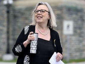Green Party MP Elizabeth May looks on before the start of a news conference on Parliament Hill in Ottawa, on June 21, 2022.