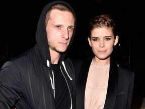 Jamie Bell and Kate Mara attend the H&M show as part of the Paris Fashion Week Womenswear Fall/Winter 2016/2017 on March 2, 2016 in Paris.