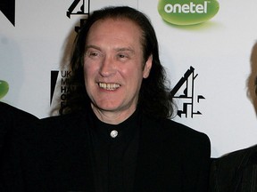 The Kinks’ Dave Davies poses backstage with the award for their induction into the UK Music Hall Of Fame 2005 at Alexandra Palace on November 16, 2005 in London, England.