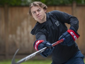 Connor Bedard in the backyard of his parent's North Vancouver, BC home Saturday, June 18, 2022. Bedard, a player for the Western Hockey League's Regina Pats, is projected to be a first-round pick in the 2023 NHL Draft.