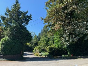 Entrance to private lane in West Vancouver's quiet Cedardale neighbourhood, where crash took place at a wedding reception on Aug. 20, killing two and injuring several more.