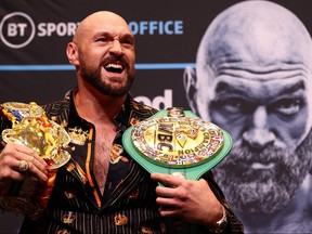 World Boxing Council (WBC) heavyweight title holder Britain's Tyson Fury takes part in an pre-fight press conference at Wembley Stadium in west London, on April 20, 2022.