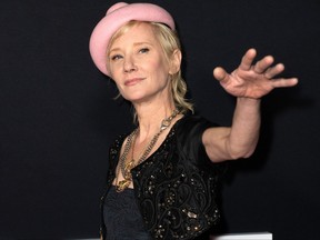 In this file photo taken on Nov. 30, 2021, actress Anne Heche arrives for the premiere of Netflix's "The Unforgivable" at the Directors Guild of America in Los Angeles.
