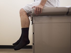 Patient sitting on medical exam table