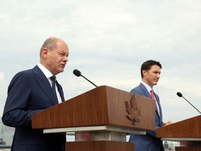 Prime Minister Justin Trudeau (right) and German Chancellor Olaf Scholz participate in a news conference in Montreal, Monday, Aug. 22, 2022.