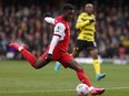 In this file photo taken on March 6, 2022 Arsenal's Portuguese defender Nuno Tavares kicks the ball during the English Premier League football match between Watford and Arsenal at Vicarage Road Stadium in Watford, north-west of London. may be used in extra time. No video emulation. Social media in-match use limited to 120 images. An additional 40 images may be used in extra time. No use in betting publications, games or single club/league/player publications. /