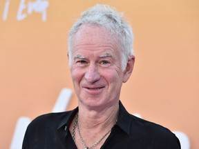 US former professional tennis player John McEnroe arrives to attend the premiere of Netflix's "Never Have I Ever", Season Three, at the Westwood Village Theater in Los Angeles on August 11, 2022.