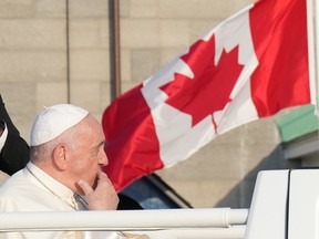 Pope Francis leaves the Citadelle in the popemobile following a reconciliation ceremony during his papal visit across Canada in Quebec City on Wednesday, July 27, 2022.