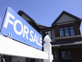 A new home is displayed for sale, in Ottawa, July 14, 2020. After fuelling Canada's economy through the COVID-19 pandemic, the real estate market is showing signs of weakness as home prices fall and bidding wars dissipate.