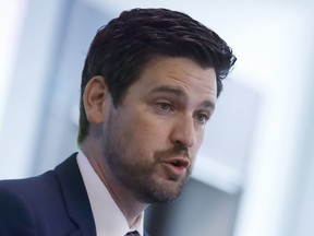 Sean Fraser speaks at an event in Ottawa on Tuesday, June 7, 2022. The immigration minister says his department is going on a hiring blitz to bring 1,250 new employees on board to tackle massive backlogs in processing applications.THE CANADIAN PRESS/ Patrick Doyle