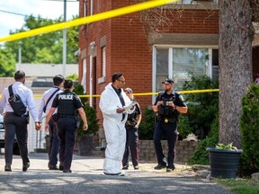 Peel Regional Police are pictured on Aug. 16, 2022, at a homicide scene at a historic home in Streetsville.