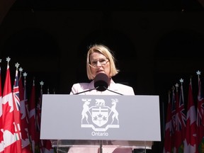 Sylvia Jones, Deputy Premier and Minister of Health takes her oath at the swearing-in ceremony at Queen's Park in Toronto on June 24, 2022. Ontario's health minister is emphasizing today that people in the province will always be able to access health care without paying out of pocket, a day after she came under fire for refusing to rule out further privatization in the system.