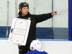 Jason Krog directs a drill during an informal practice session for some Vancouver Canucks players this week in Burnaby. ‘Getting them ready for camp so that they feel good and they feel prepared,’ Krog says of his job.