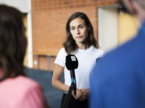 Prime Minister of Finland Sanna Marin answers journalists' questions on Aug. 18, 2022 in Kuopio, Finland before the start of the Social Democratic Party's parliamentary group summer meeting.