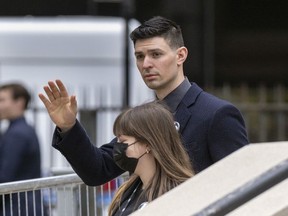 Montreal Canadiens goalie Carey Price waves to fans outside the funeral for Guy Lafleur at Mary Queen of the World Cathedral in Montreal Tuesday May 3, 2022.