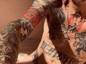 Tommy Lee shared a naked photo of himself sitting in a bathroom, Thursday, Aug. 11, 2022.