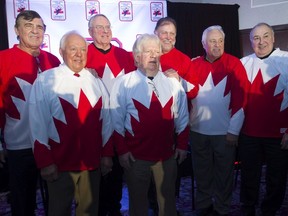 Former 1972 team Canada members gather at the end of a press conference in Montreal Tuesday, February 9, 2016 to announce the '72 Summit Series Tour. From the left are: Serge Savard, Yvan Cournoyer, Ken Dryden, Pat Stapleton, Pete Mahovlich, Phil Esposito and Guy Lapointe.