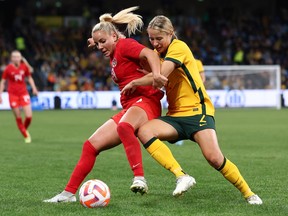 Adriana Leon of Canada is challenged by Courtney Nevin of Australia during the International Friendly Match between the Australia and Canada at Allianz Stadium on September 06, 2022 in Sydney, Australia.